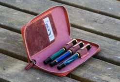 Galen Leather Zippered Three Pen Case In Crazy Horse Orange