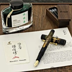 Namiki Yukari 100th Anniversary Fountain Pen In Seven Gods Fuku-roku-ju - 18K Gold Medium Point -Pen & Paper Store namiki yukari 100th anniversary fountain pen in seven gods fuku roku ju 18k gold medium point 988